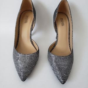 Michael Kors silver pumps.